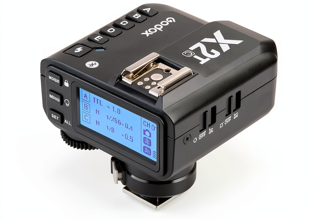 Godox X2 trigger mounted on a Canon DSLR in a studio setting